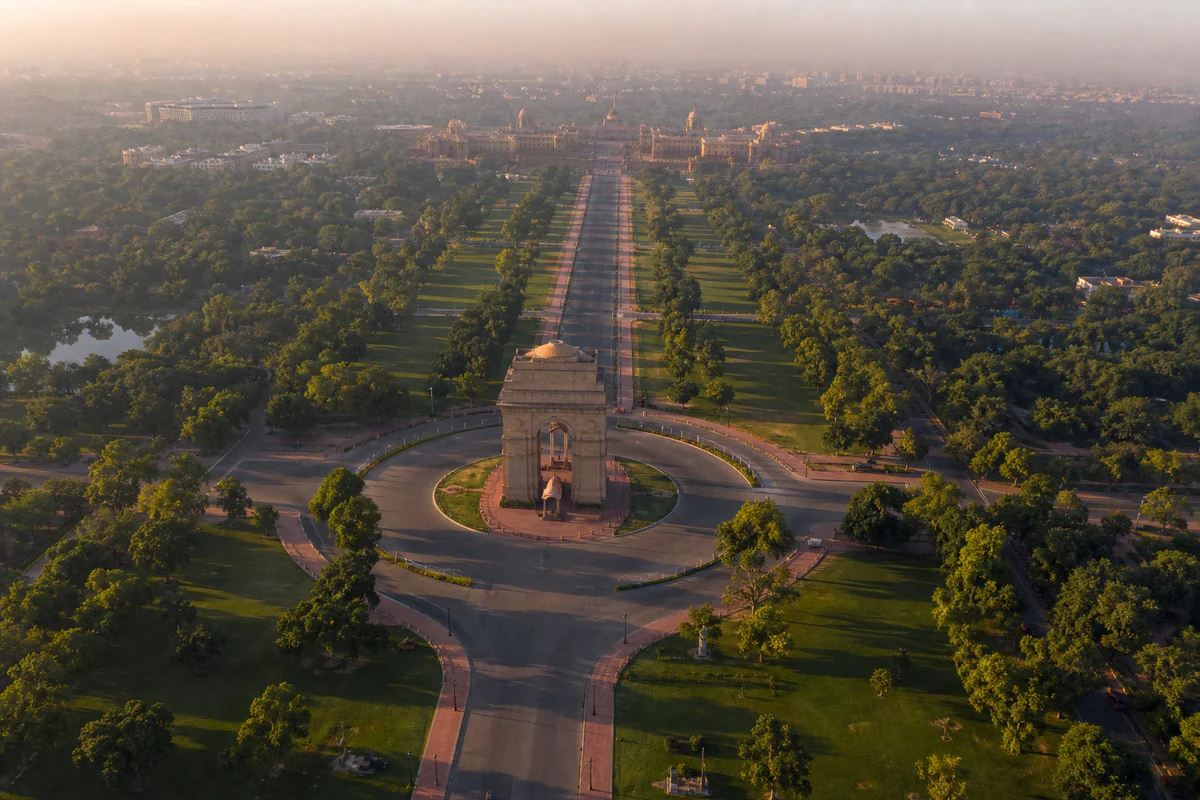 Aerial travel view of United States, illustrating India Residential Status: 182 Days, 60+365, and the 2026 Transition.