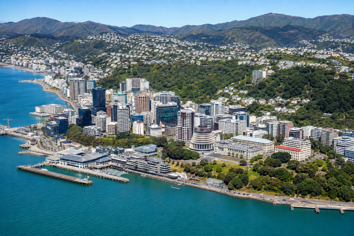 Aerial travel view of New Zealand, illustrating New Zealand's 275-Day Visitor Rule: Why the 183-Day Test Is Not the Whole Story.
